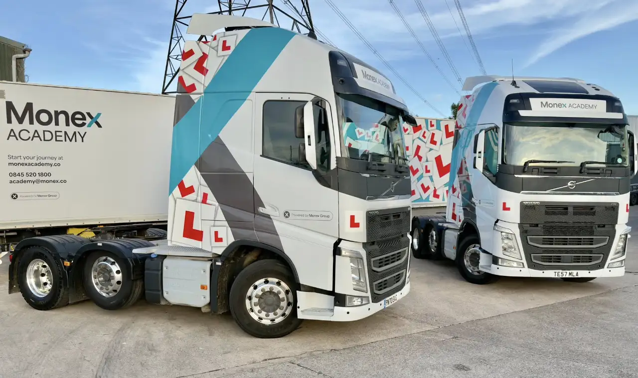 Banner width photo of 2 of the Monex Academy Category C+E (Class 1) training HGV lorrys
